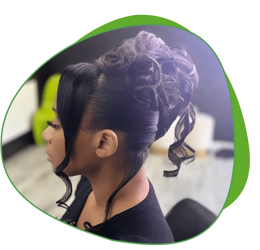Elegant updo hairstyle with curled strands for a formal look.